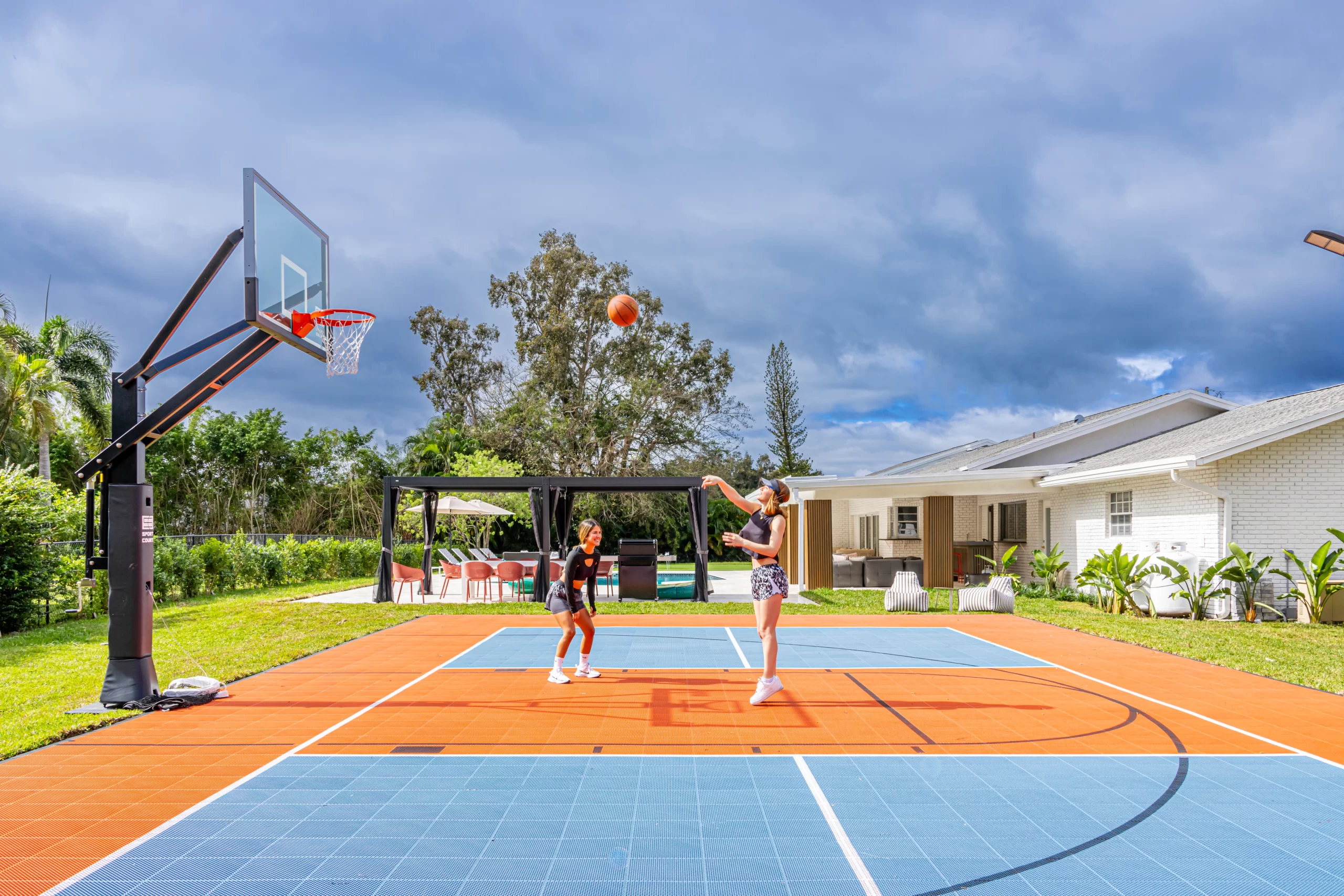Women playing basketball